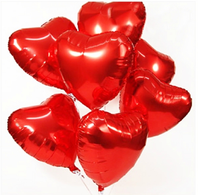 7 red heart shaped balloons