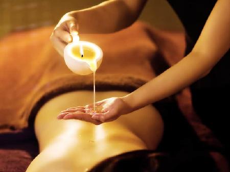Massage with warm candles (55 min)
