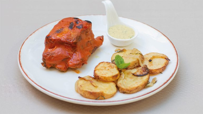 Pork ribs in oven with barbeque sauce